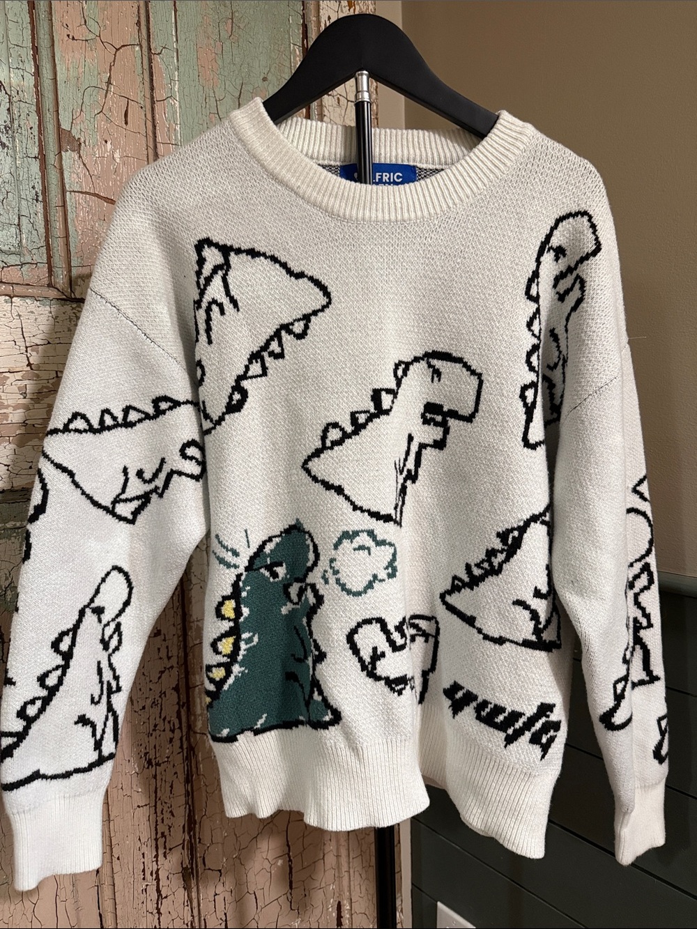 Aelfric Eden White Crewneck Sweater with Black Dino Motif and Teal Accent